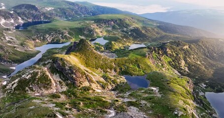 Wall Mural - seven rila lakes and mountain peaks and hills, beautiful nature of bulgaria, sunrise aerial view 4k 