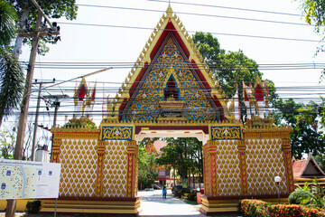 Gate entrance for thai people travelers travel visit and respect praying blessing holy buddha mystery worship of Wat See Roy or Si Roi temple at Wiset Chai Chan on June 6, 2023 in Ang Thong, Thailand