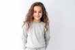 © igolaizola - Portrait of a cute little girl with long curly hair on a white background