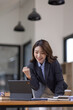 © David - Excited asian woman sit at desk feel euphoric win online lottery, happy asian woman overjoyed get mail at tablet being promoted at work, biracial girl amazed read good news at computer