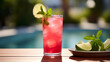 © Yuki Liu - Refreshing summer drink with watermelon and ice in a glass on a wooden table on beach background