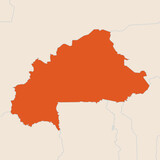 Fototapeta  - Map of the country of Burkina Faso highlighted in orange isolated on a beige blue background