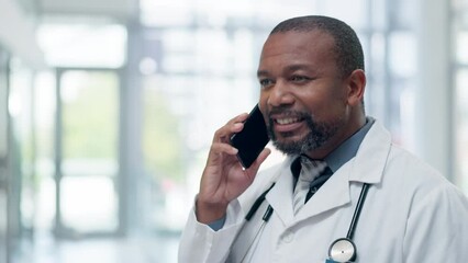 Wall Mural - Black man, doctor and talk on phone call with medical consultation in a hospital for healthcare. Clinic, networking and smile from a wellness professional with communication for work with advice