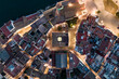 © AmazingAerialAgency - Aerial top down view of Sitges city hall at sunset along the Mediterranean Sea, Barcelona, Spain.