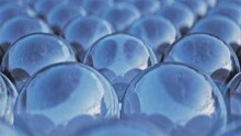 Multiple Blue Glass Reflective Mirror Spheres Background. Seamless Loop. Looping Animation. Cinematic Photorealistic 3d Animation. High Quality 4k Footage