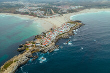 Aerial View Of Ilha Do Baleal, A Small Town On Island At Sunset Along The Ocean Coastline In Leiria, Portugal.