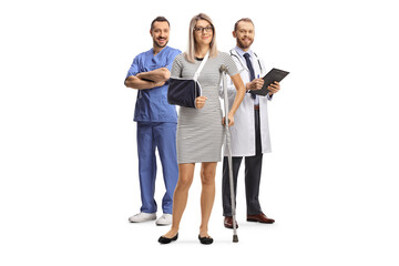 Poster - Woman with an injured arm and leg standing with a male doctors