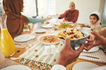 Wall Mural - Food, roti and muslim with hands of family at table for eid mubarak, Islamic celebration and lunch. Ramadan festival, culture and iftar with closeup of people at home for fasting, islam or religion