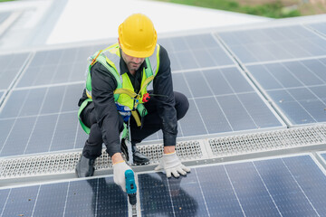 Wall Mural - Professional specialist technician engineer working to maintenance checking and installing solar roof panel on the factory rooftop under sunlight. Worker inspection team for smart grid ecology energy