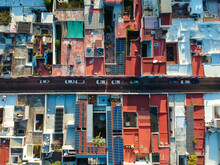 Aerial View Of A Residential District With House Blocks And Colourful Rooftop In Santiago De Queretaro, Mexico.