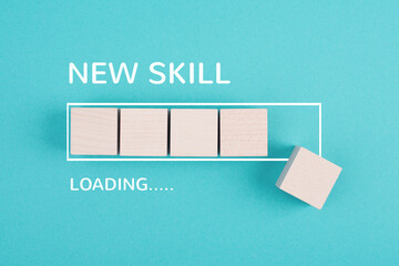 Progress bar with the words new skill loading, education concept, having a goal, online learning, knowledge is power strategy
