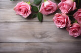 Fototapeta Kwiaty - pink rose composition on wooden tabletop Generative AI