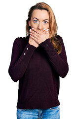 Poster - Young caucasian woman wearing casual clothes shocked covering mouth with hands for mistake. secret concept.