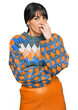 © Krakenimages.com - Young hispanic woman wearing casual clothes looking stressed and nervous with hands on mouth biting nails. anxiety problem.