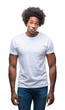 © Krakenimages.com - Afro american man over isolated background skeptic and nervous, frowning upset because of problem. Negative person.