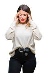 Wall Mural - Young beautiful woman casual white sweater over isolated background with hand on head for pain in head because stress. Suffering migraine.