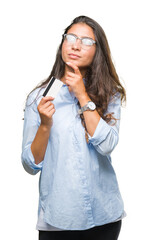 Poster - Young arab woman holding credit card over isolated background serious face thinking about question, very confused idea