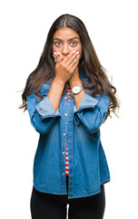 Poster - Young beautiful arab woman over isolated background shocked covering mouth with hands for mistake. Secret concept.