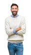 © Krakenimages.com - Adult hispanic man wearing winter sweater over isolated background happy face smiling with crossed arms looking at the camera. Positive person.