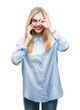 © Krakenimages.com - Young beautiful blonde business woman calling on smartphone over isolated background with happy face smiling doing ok sign with hand on eye looking through fingers