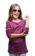 © Krakenimages.com - Young beautiful girl wearing sunglasses over isolated background with a big smile on face, pointing with hand and finger to the side looking at the camera.