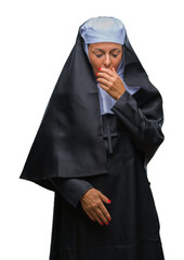 Canvas Print - Middle age senior christian catholic nun woman over isolated background feeling unwell and coughing as symptom for cold or bronchitis. Healthcare concept.