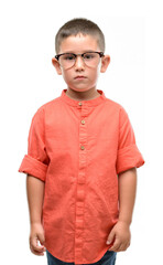 Sticker - Dark haired little child wearing glasses with a confident expression on smart face thinking serious