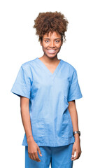 Wall Mural - Young african american doctor woman over isolated background with a happy and cool smile on face. Lucky person.