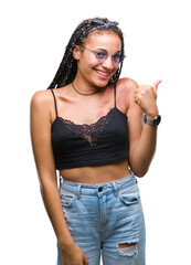 Sticker - Young braided hair african american with birth mark wearing sunglasses over isolated background doing happy thumbs up gesture with hand. Approving expression looking at the camera