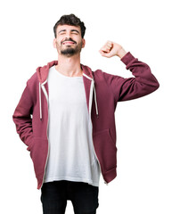 Wall Mural - Young handsome man over isolated background stretching back, tired and relaxed, sleepy and yawning for early morning