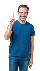 Poster - Handsome middle age hoary senior man wearin glasses over isolated background showing and pointing up with finger number one while smiling confident and happy.