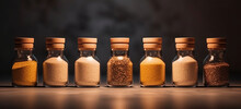 A Set Of Spices In Glass Jars On A Gray Uniform Background. Oriental Spices, Assorted Spices In Flasks. A Spicy Paprika Created In AI.
