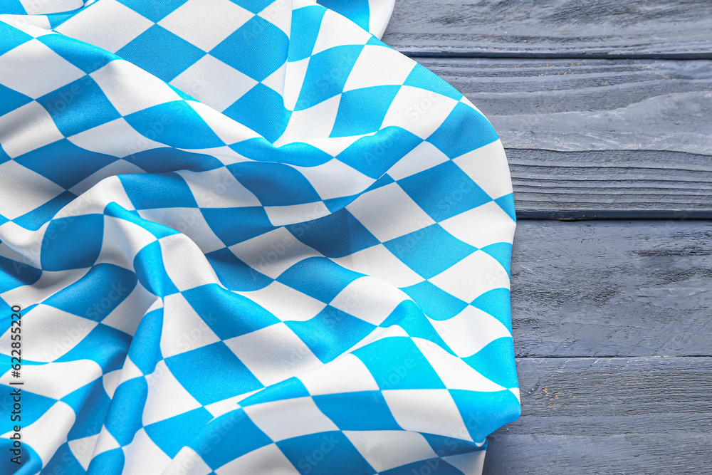 Flag of Bavaria on blue wooden background