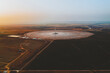 © AmazingAerialAgency - Aerial view of a big circular solar plant in Andalusia near Seville, Spain.