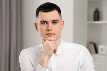 Poster - Young man having online video call at home, view from web camera