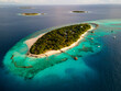 © AmazingAerialAgency - Aerial view of tropical island with water villa, Baa Atoll, Maldives.