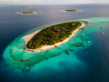Aerial View Of Tropical Island With Water Villa, Baa Atoll, Maldives.