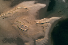Aerial View Of Mesmerising Abstract Sand Dunes Shapes Of Neretva River Delta Near The City Of Ploce In Southern Croatia.
