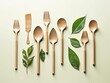Wooden decomposable forks and spoons on a light surface with green leaves.conceptual ecology and recycling problem.flat lay. Generative AI