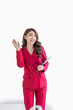 © David - Image of young model asian woman in red suit jacket posing in fashion studio. holding digital tablet, standing over isolated on light white background