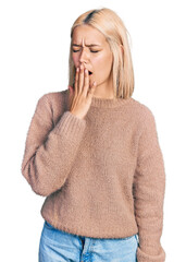 Canvas Print - Beautiful young blonde woman wearing brown sweater bored yawning tired covering mouth with hand. restless and sleepiness.