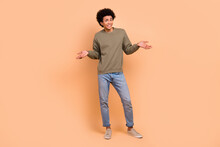 Full Body Length Photo Of Excited Unsure Funny Guy Shrug Shoulders No Idea Misunderstanding Dont Know Answer Isolated On Beige Color Background