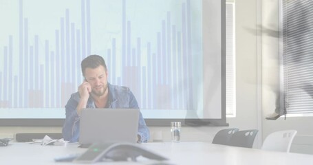 Canvas Print - Animation of caucasian businessman using computer over data processing and cityscape