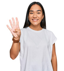 Poster - Young asian woman wearing casual white t shirt showing and pointing up with fingers number four while smiling confident and happy.