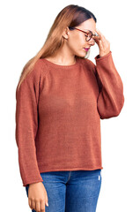 Canvas Print - Beautiful young woman wearing casual clothes and glasses tired rubbing nose and eyes feeling fatigue and headache. stress and frustration concept.