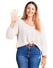 Poster - Beautiful young woman wearing casual clothes showing and pointing up with fingers number five while smiling confident and happy.