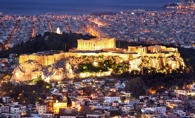 Wall Mural - Cityscape of Athens with illuminated Acropolis hill, Pathenon and sea at night, Greece