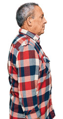 Poster - Senior hispanic man wearing casual clothes looking to side, relax profile pose with natural face with confident smile.