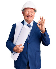 Sticker - Senior handsome grey-haired man wearing architect hardhat holding blueprints doing ok sign with fingers, smiling friendly gesturing excellent symbol