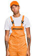 © Krakenimages.com - Young handsome african american man wearing handyman uniform depressed and worry for distress, crying angry and afraid. sad expression.